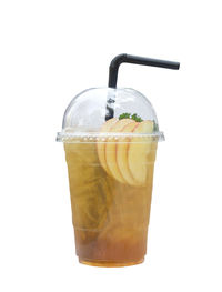 Close-up of drink against white background