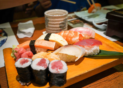 Close-up of sushi served on table