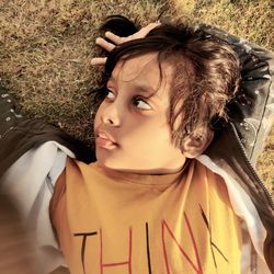 Portrait of young woman wearing hat