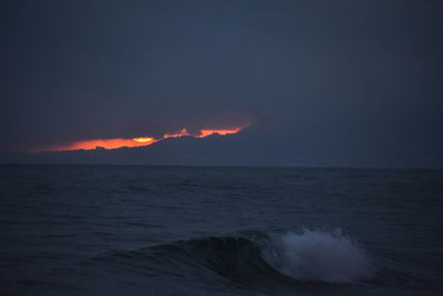 Scenic view of sea against sky during sunset
