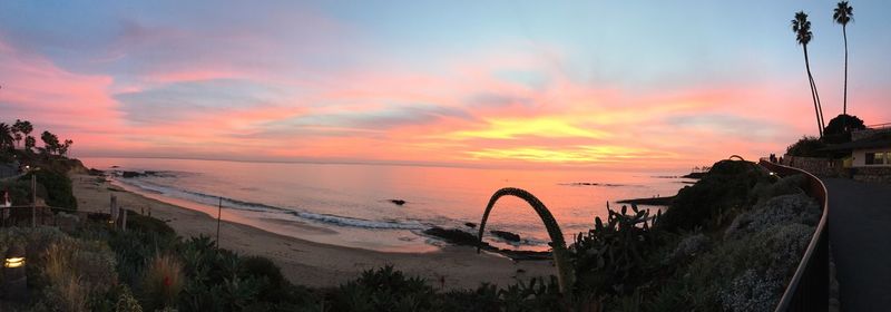 Panoramic view of sea against sky during sunset