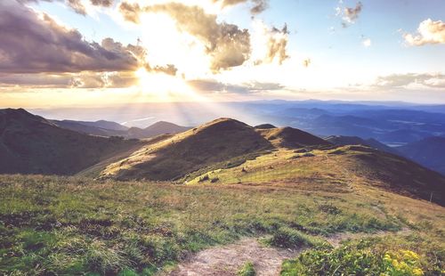 Scenic view of landscape against sky during sunset