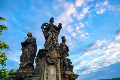 Low angle view of statue against sky