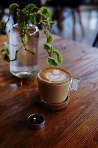 Close-up of coffee cup on table