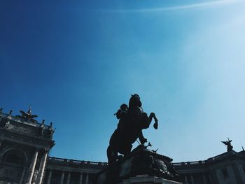 Low angle view of statue against clear sky