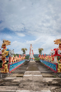 Statue of temple against sky