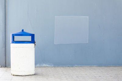 Close-up of blue paint on white wall