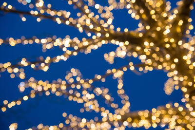 Defocused image of illuminated christmas lights