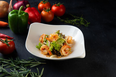 High angle view of vegetables in bowl on table