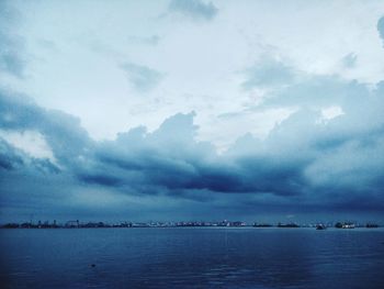 Scenic view of sea against blue sky