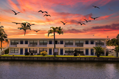 View of buildings against sky during sunset