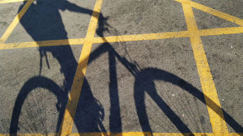 High angle view of shadow on street