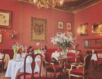 Chairs and flowers in room