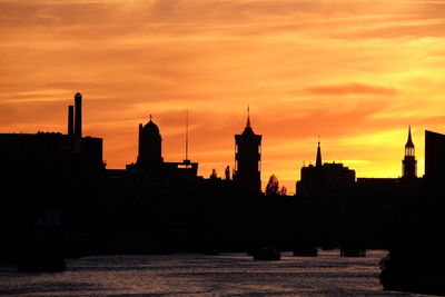Silhouette of buildings at sunset