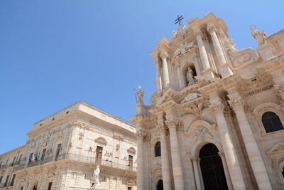 Low angle view of historic building against clear sky