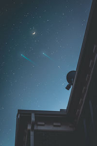 Low angle view of building against sky at night