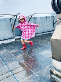 High angle view of girl standing on street