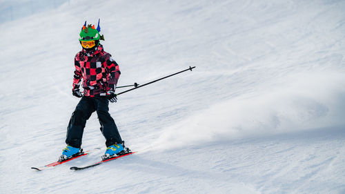 Person with umbrella in snow