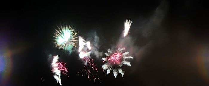 Firework display at night