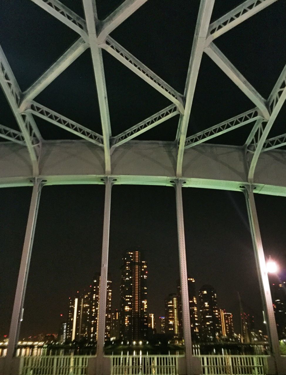 architecture, built structure, low angle view, building exterior, modern, night, illuminated, city, pattern, building, architectural feature, glass - material, office building, ceiling, indoors, no people, sky, skyscraper, window, repetition