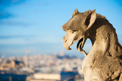 Close-up of statue against sky