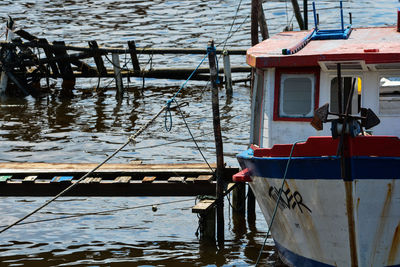 Fishing boat moored in lake