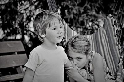 Portrait of mother and daughter outdoors