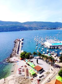 High angle view of sailboats in sea against sky