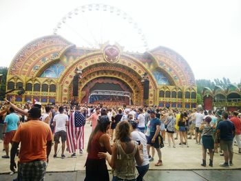 People at town square against clear sky