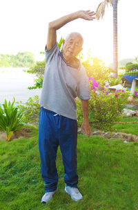 Full length of man standing in yard