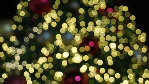 Defocused image of illuminated christmas lights