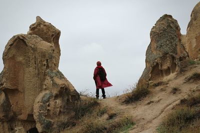 Man standing on rock formation