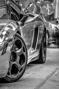 Close-up of vintage car on street