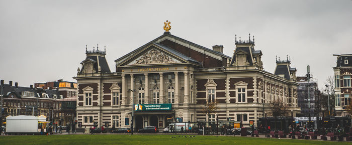 Building against cloudy sky