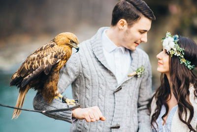 Young couple on wall