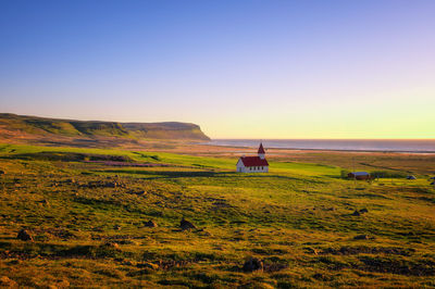 Scenic view of landscape against sky during sunset