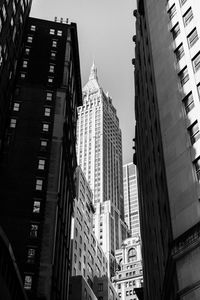 Low angle view of skyscrapers against sky