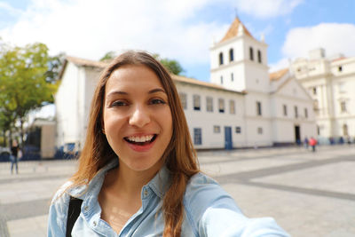 Portrait of a smiling young woman