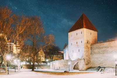 Low angle view of building against sky at night