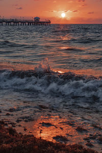 Scenic view of sea against sky during sunset