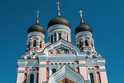 Low angle view of building against blue sky