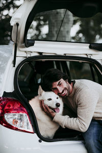 Portrait of dog in car