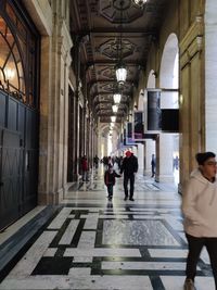 People walking in building