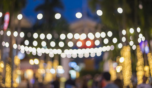 Close-up of illuminated christmas lights at night