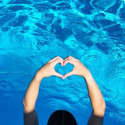 High angle view of heart shape in swimming pool