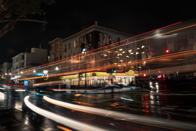 Light trails on street in city at night