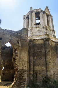 Low angle view of old building against sky