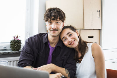 Portrait of smiling young couple