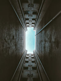 Low angle view of illuminated tunnel