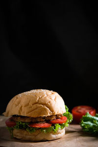 High angle view of food on table against black background